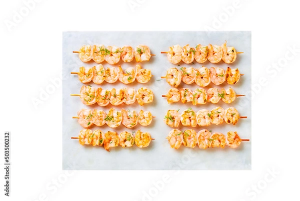 Fototapeta Grilled shrimps kebabs and on the white plate