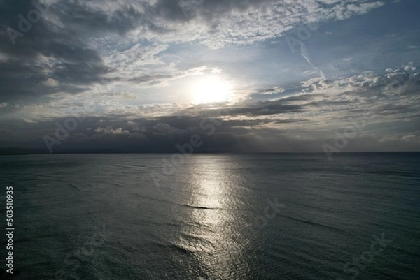 Fototapeta Sunset and clouds