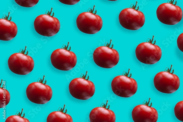 Fototapeta Tomatoes texture with blu background