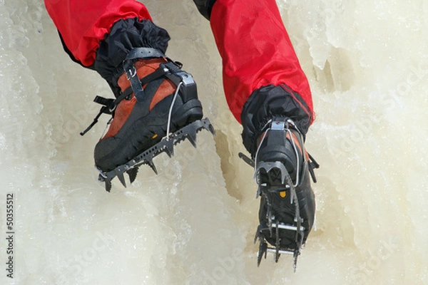 Obraz Ice climbing crampons in use closeup