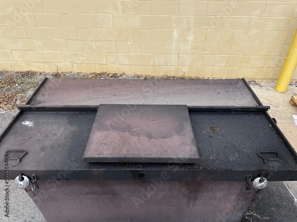 Fototapeta Locked Solid waste trash compactor top down