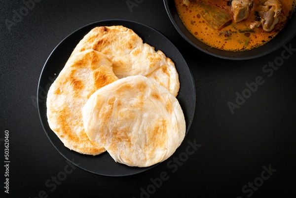 Fototapeta Chicken curry soup with roti