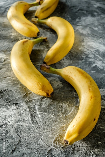 Obraz banana on a wooden background
