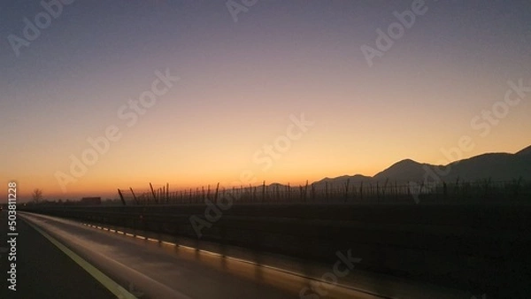 Fototapeta sunset over the river