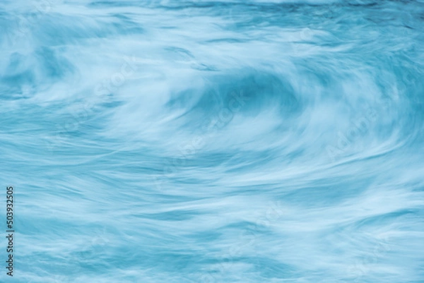 Obraz Turquoise ocean waves as backdrop. Sea water boils and foams during surf. Mountain blue river with fast current