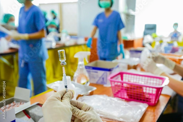 Obraz COVID-19 Vaccine. Corona Virus SARS CoV 2, 2019 nCoV virus destruction. A vaccin against coronavirus disease 2019.Vaccination and prevention against corona Virus .