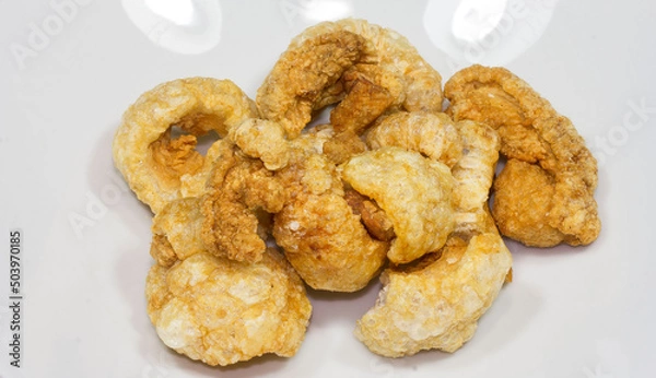 Obraz Pork skins or lean pork skins are fried to a puffy and crispy texture