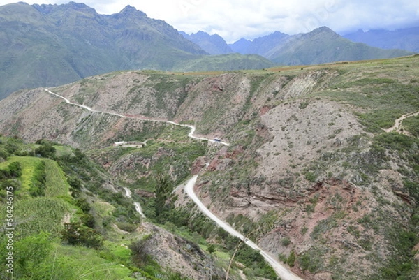 Fototapeta The road between the mountains to the salt terraces of Maras in the Andes mountain range in the region of Cusco, Peru