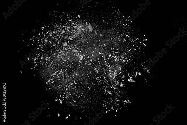Fototapeta White powder explosion on black background. Colored cloud. Colorful dust explode. Paint Holi.
