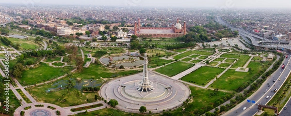 Fototapeta Beautiful and Historical Royal Mosque Badshahi Masjid and Minar-e-Pakistan Lahore Punjab. Aerial views of Iqbal Park, Drone's Footage