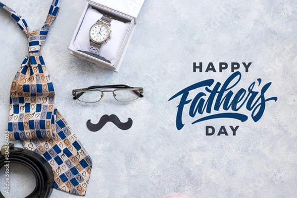 Fototapeta Design concept top view of Father's day gift idea with greeting on wood background.	