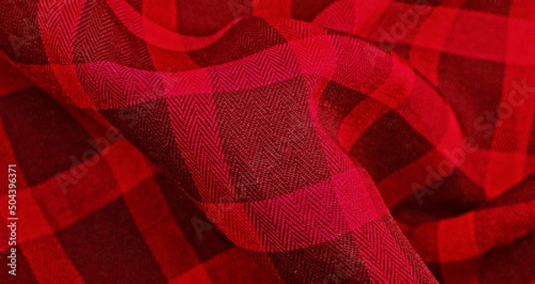 Fototapeta Red Clothes backdrop. Background luxury red wavy cloth. Wavy folds of grunge silk texture satin velvet clothing, luxurious background or elegant wallpaper