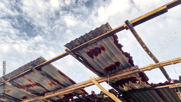 Fototapeta Broken rust galvanized roof