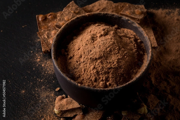 Obraz Broken chocolate nuts pieces