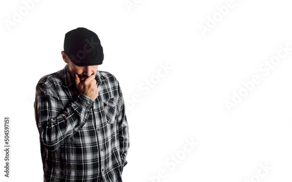 Fototapeta Man with doubtful and pensive attitude. Person with beret and plaid shirt on white background