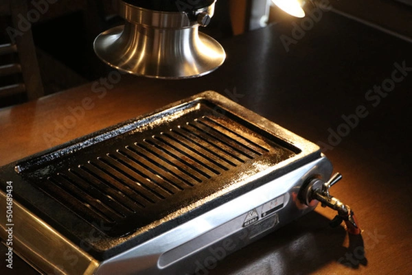 Obraz 高級感ある焼肉屋の鉄板（網焼き）