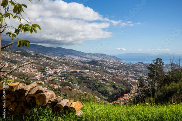 Fototapeta Madeira with big clouds and view on atlantic ocean