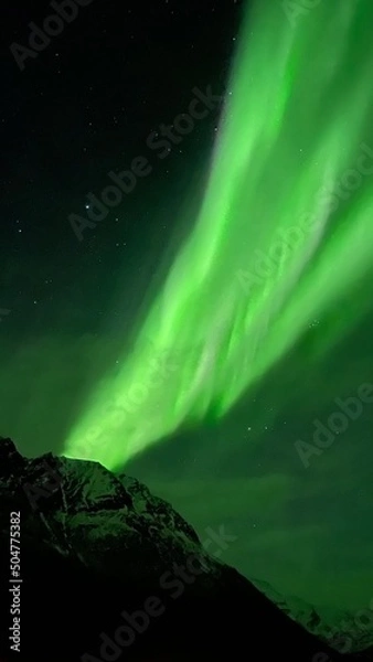 Obraz aurora borealis above the clouds