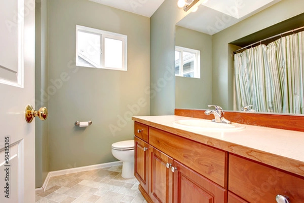 Fototapeta Green clean new bathroom with wood cabients.