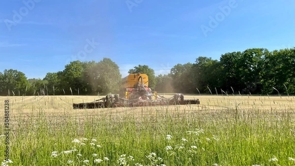 Fototapeta Old combine harvester in the field