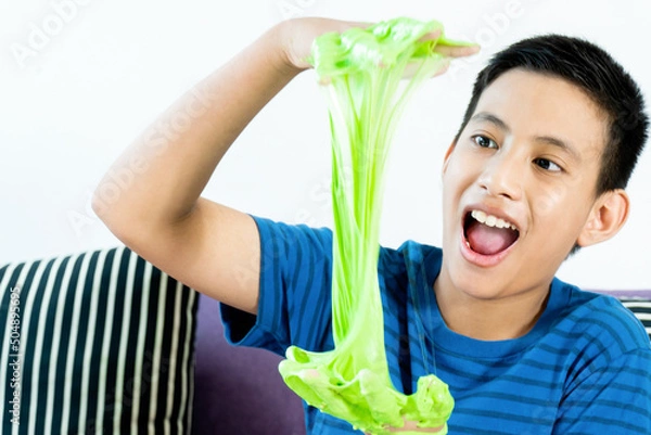 Obraz Homemade Toy Called Slime, Kids having fun and being creative by science experiment