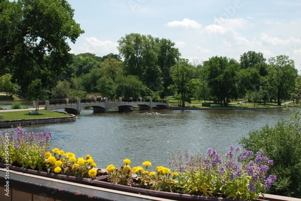 Obraz Geneva, Illinois, USA. July 1, 2020. The view from the State Street / Route 38 bridge over the Fox River, looking out on Island Park.
