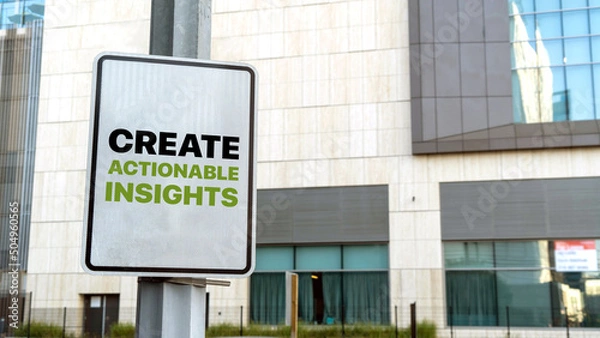 Fototapeta Create Actionable Insights on a Sign in Downtown city setting	