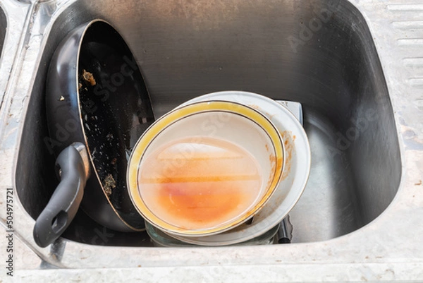 Obraz Dirty dishes in the sink after lunch.