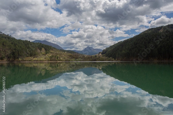 Fototapeta A series of reflections on the Drina River with reflection. Symmetry and harmony.