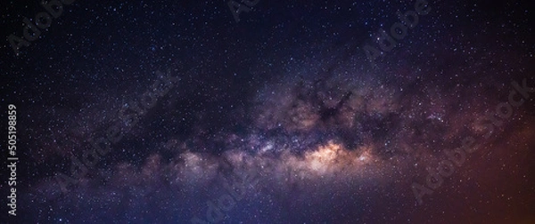 Fototapeta Milky way in the night sky and stars on dark background with noise and grain. Photo taken with long exposure and white balance selected.	
