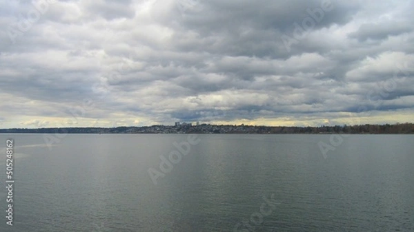 Fototapeta clouds over the lake