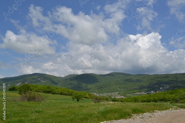 Obraz landscape with clouds and mountains