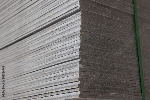 Fototapeta Magnesium oxide wallboard ligs in stack on building placeMagnesium oxide wallboard legs in stack on building place