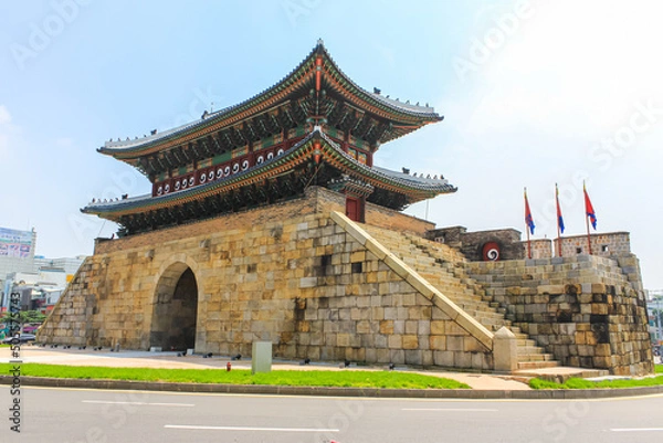 Obraz Seoul, South Korea - July 26, 2020 - Paldalmun Gate is the southern gate of Hwaseong Fortress. The gate has an entrance wide enough to let the king's palanquin pass through. Roundabout runs around