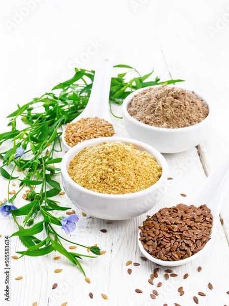 Obraz Bran and flour flaxseed in bowls on wooden board