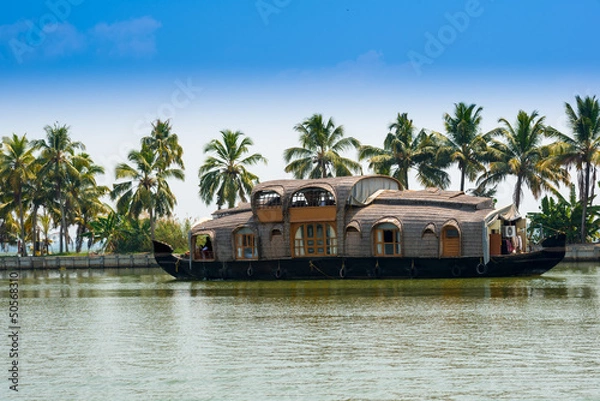 Obraz landscape with reflection houseboat in kerala backwaters, India