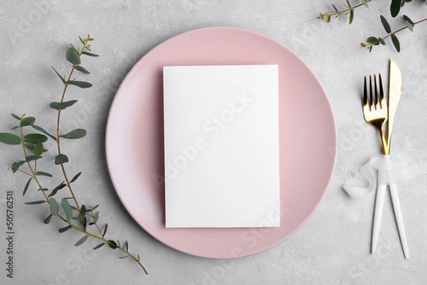 Obraz Wedding stationery invitation card mockup 5x7 on grey background with eucalyptus, Menu card mockup with festive wedding or birthday table setting, pink ceramic plate. Minimal blank card mockup