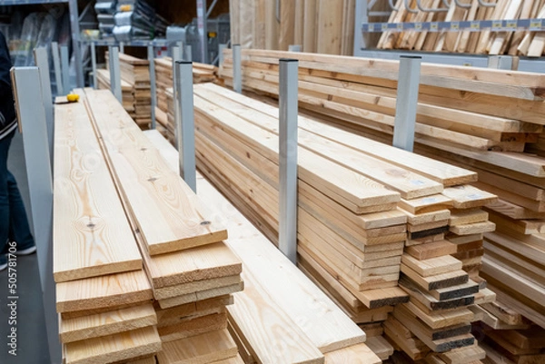 Fototapeta Lumber is sold in a store for construction and repair