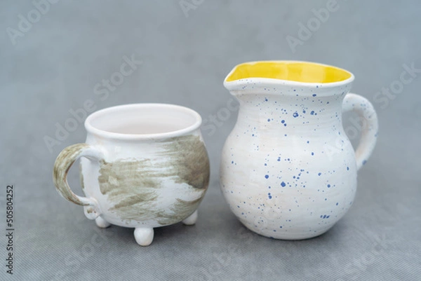 Obraz     Ceramics, a ceramic product made with hands, made on a potter's wheel, a jug, a mug, clay.