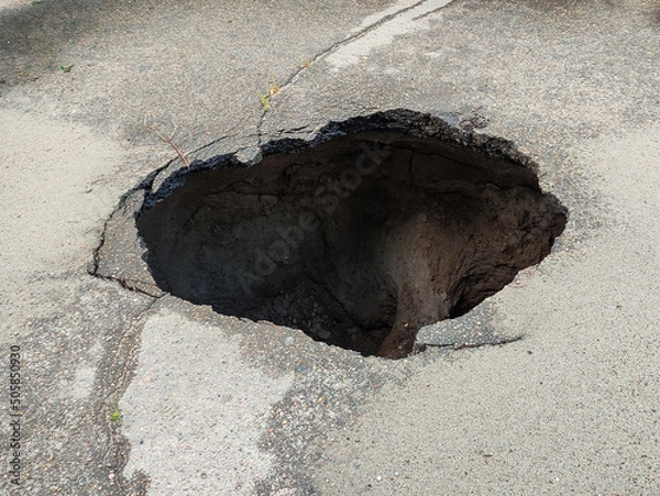 Obraz Large hole in the asphalt, sinkhole
