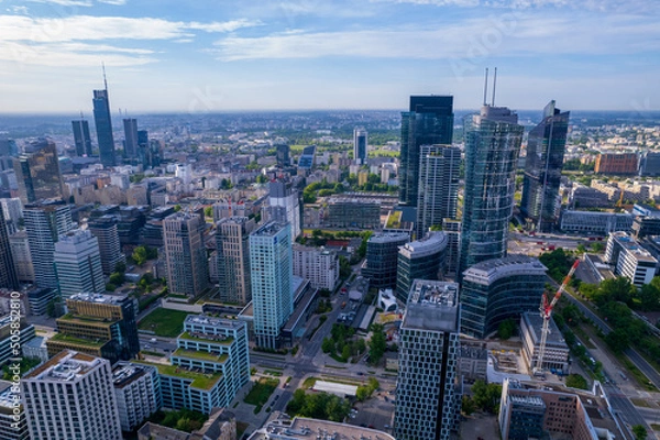 Fototapeta Warsaw overcast. The capital of Poland from a drone. Panorama of Warsaw from the side of Wola.