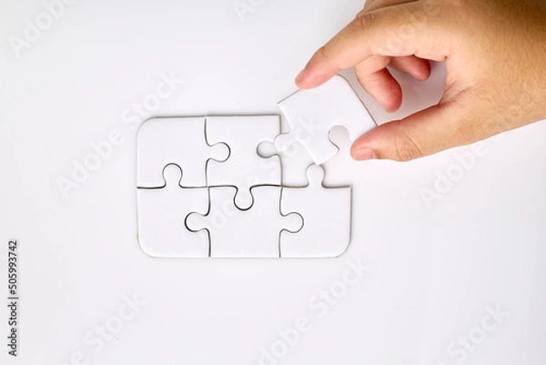 Obraz White puzzle on the table