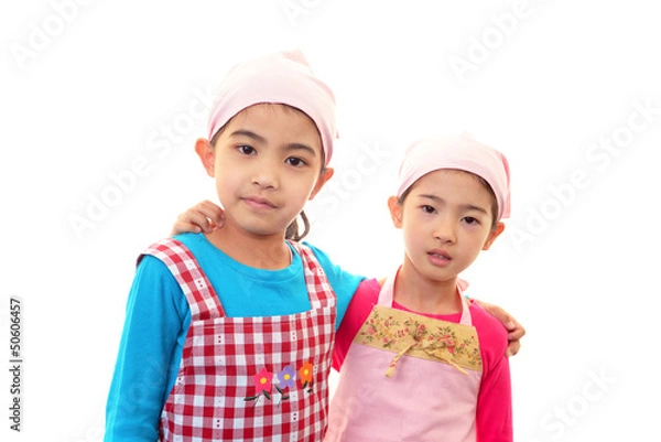 Fototapeta エプロンを着た二人の女の子