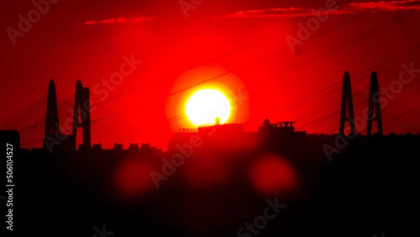 Obraz red sunset over the city close up