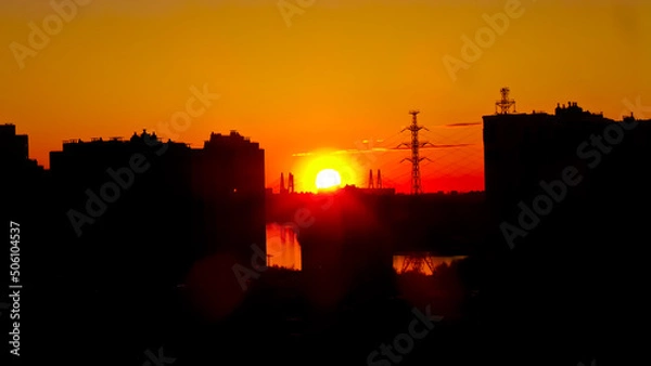Obraz red sunset over the city close up