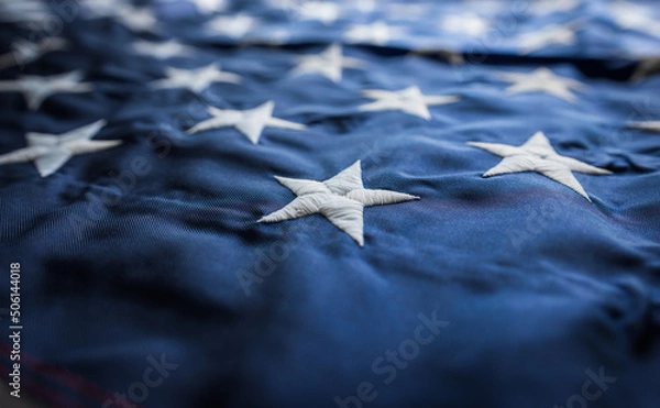 Fototapeta background. American flag in national colors. blur, out of focus.