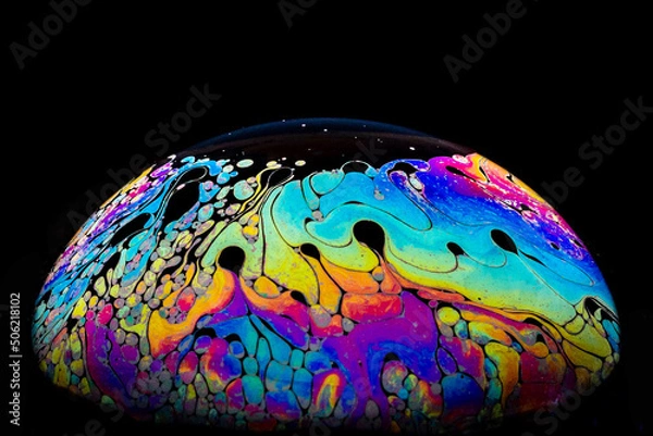 Fototapeta Soap bubble against a black background