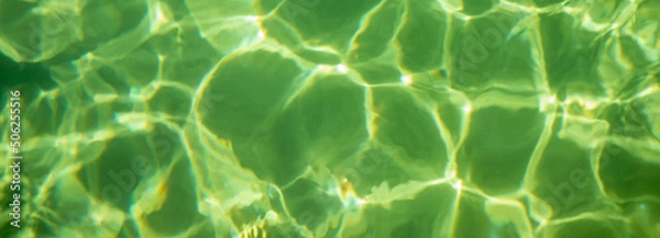 Fototapeta Ripple wave and clear water surface in swimming pool. Abstract nature background. Top view