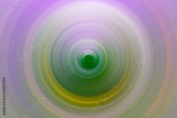 Fototapeta Lit circular blur in green, yellow and purple tones
