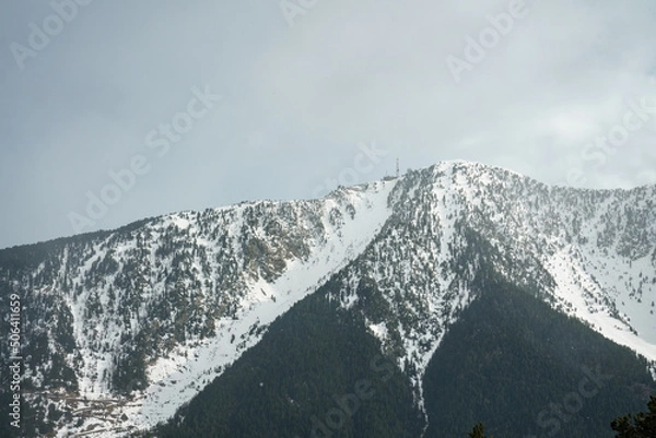 Fototapeta Pal, Andorra. April 2022. Stormy day in the Pyrenees of Andorra. Last snowfall of the season in early spring.